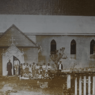 a group of people standing in front of a building