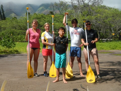 a group of people posing for the camera