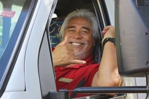 a man sitting in a car